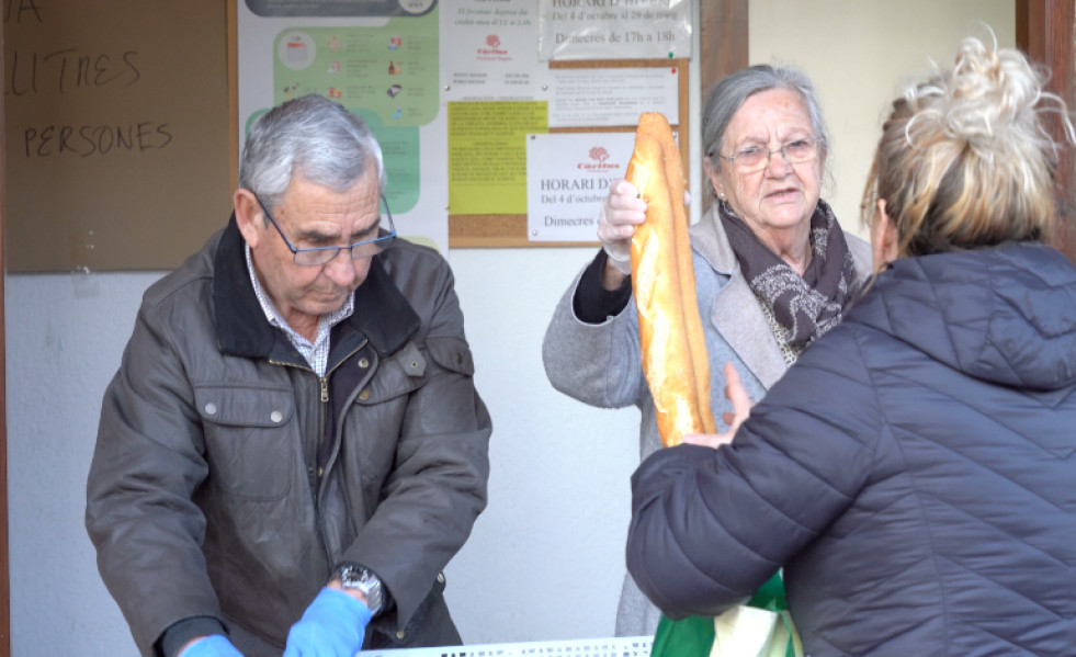 Caritas repartint aliments