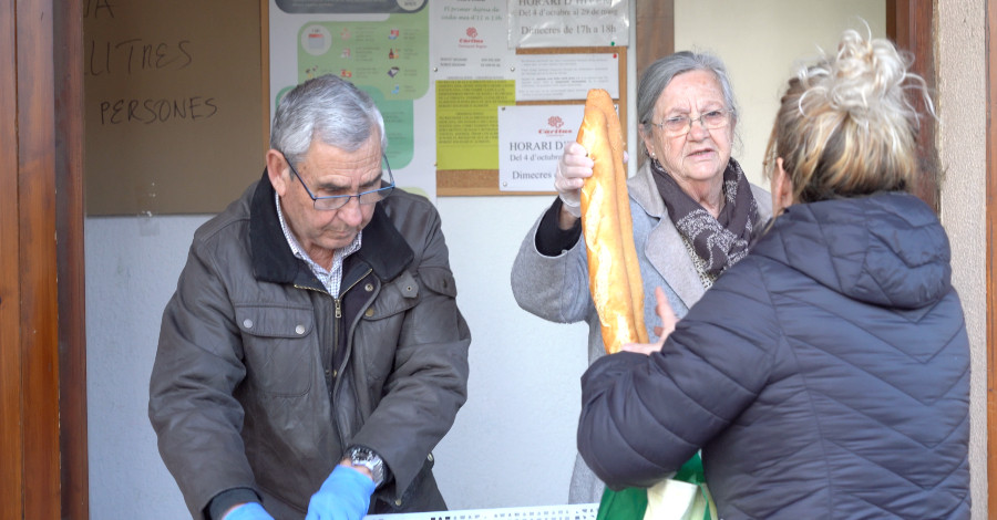 Caritas repartint aliments