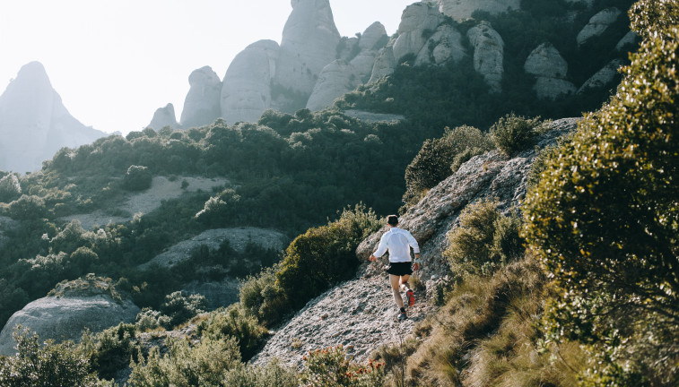 Cool man with tattoos ultra trail runner